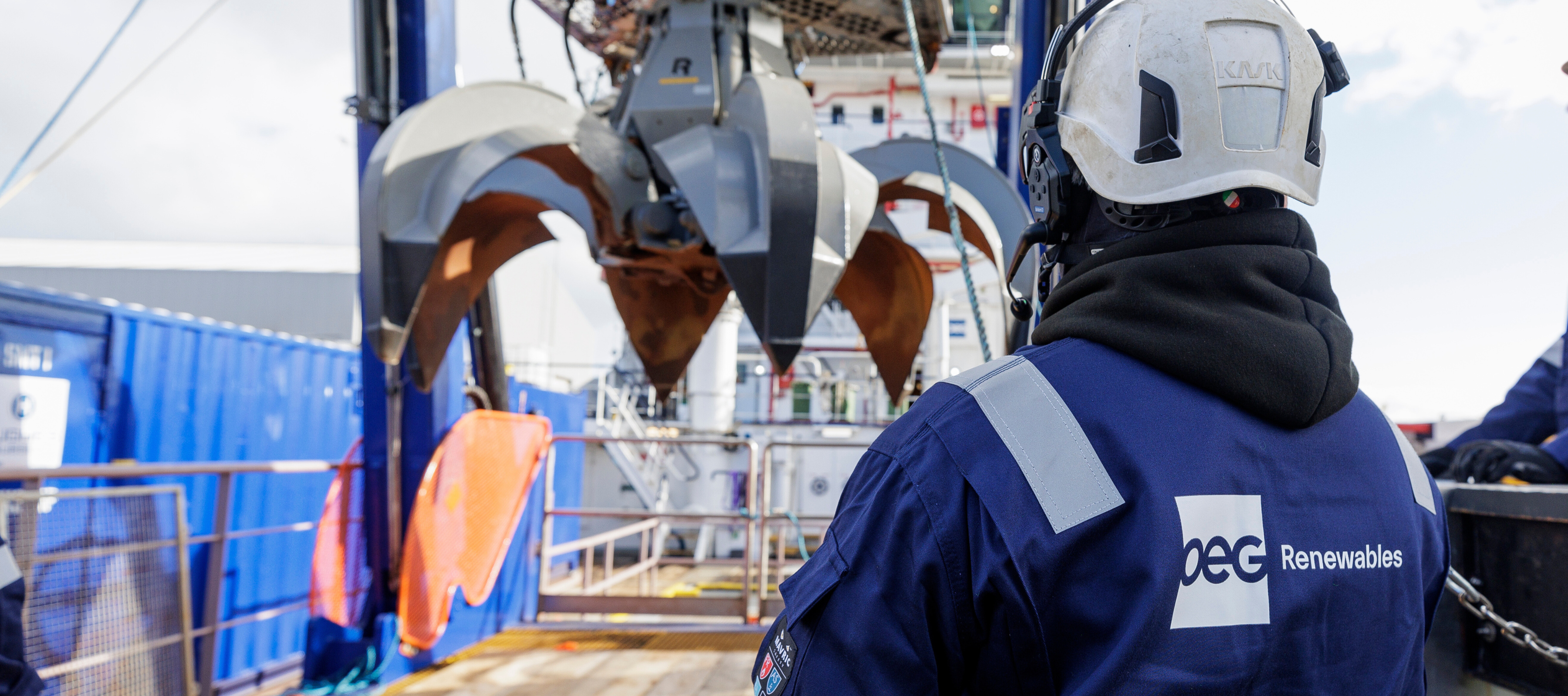 A contractor onboard a project vessel looking at a SMT-ROV, equipment used for boulder clearance